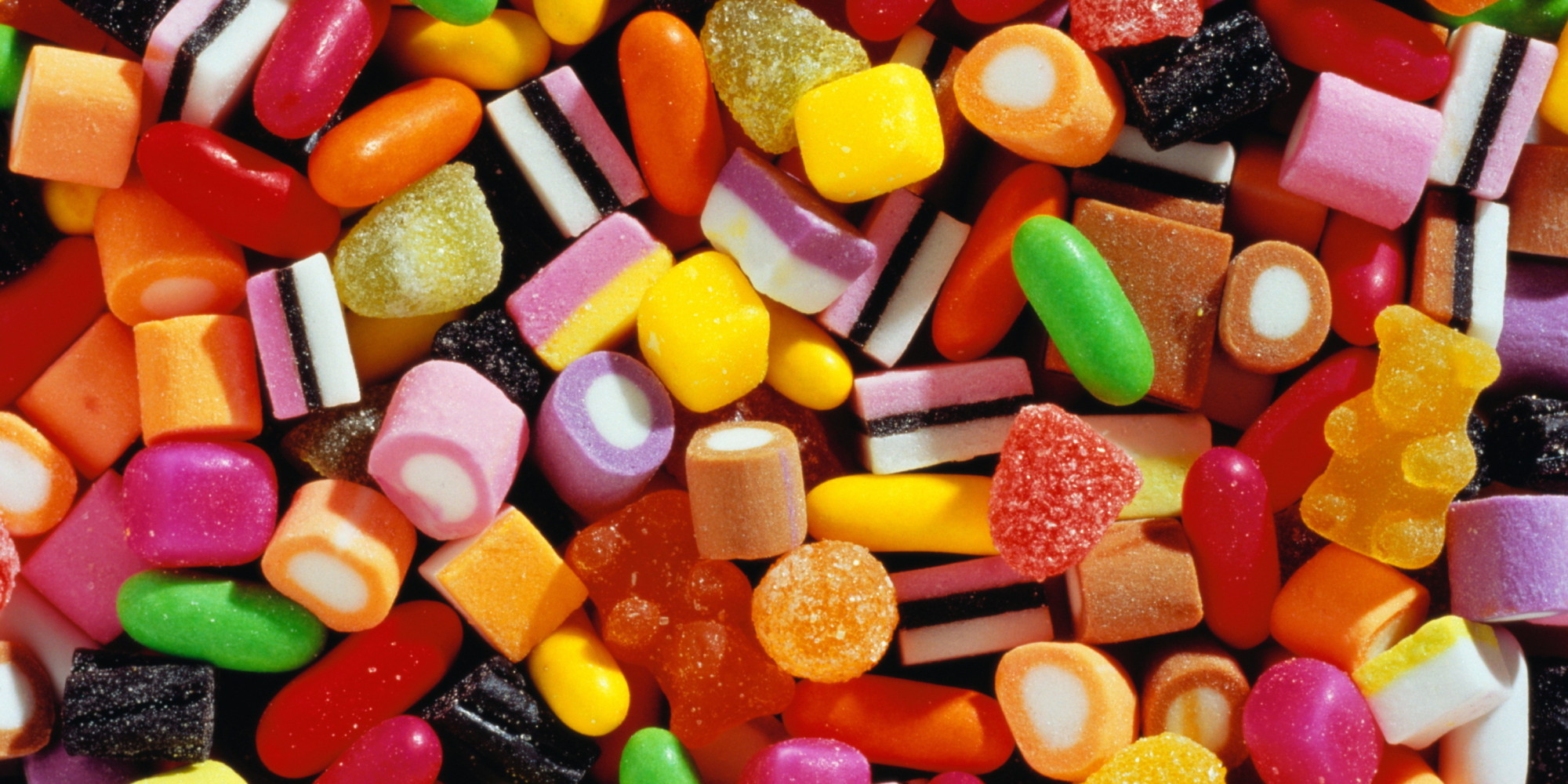 Assorted colourful childrens sweets, full-frame